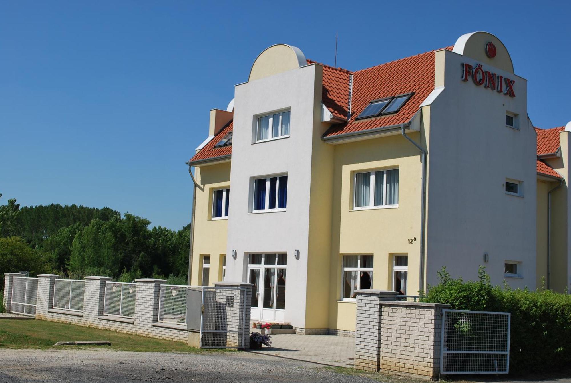 Fonix Hotel Buk Bagian luar foto